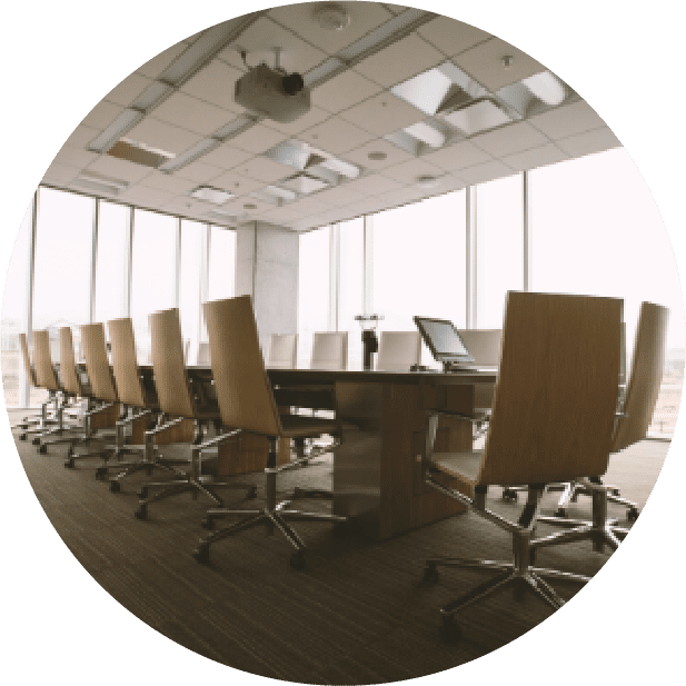 A large conference room with chairs and tables.